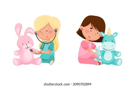 Cute kids playing doctors set. Girl curing their toys with medical tools cartoon vector illustration