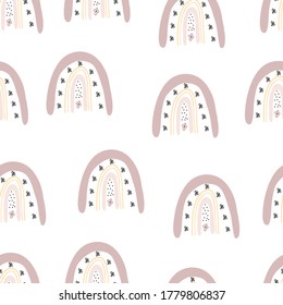 Cute kids rainbow seamless pattern. Childish pattern with hand drawn rainbows and clouds, .Creative scandinavian kids texture for fabric, wrapping, textile, wallpaper.Vector illustration.