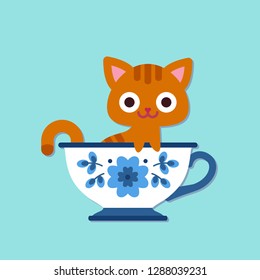 Cute kitten in a beautiful painted cup