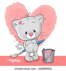 Cute Kitten with brush is drawing a heart 
