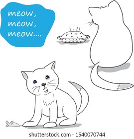 Cute kitten caught a mouse. The kitten is looking at the cake.