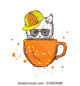 Cute kitten in a cup. Vector illustration.
