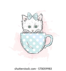 Cute kitten in a cup. Vector illustration.