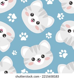 Cute kitten face with paw texture, kawaii colorful blue kids seamless pattern for wrapping paper, fabric and textile print.