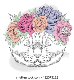 Cute kitten in a flower wreath. Vector illustration.