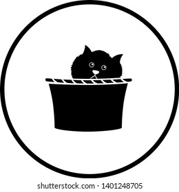 cute kitten inside a basket symbol