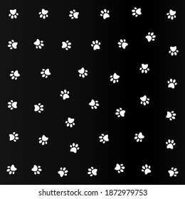 Cute kitten pow white pattern in black background. Traces of Cat Textile Pattern. vector illustration.