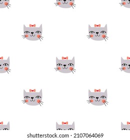 Cute kitten. Seamless pattern with a cat. Ornament with animals. Vector illustration for designing children's clothing, interior decor, postcards and posters.