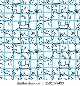 Cute kittens playing on a background of blue grids.