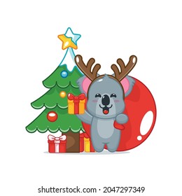 Cute koala in christmas day carrying gift. Cute christmas cartoon illustration