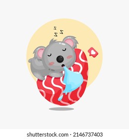 Cute koala hold an easter egg