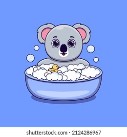 cute koala taking bath with duck toy and bubbles