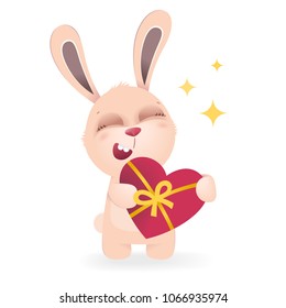 Cute laughing bunny with big eyes holding red heart with yellow ribbon and bow. Romantic and gift concept. Cartoon character vector illustration