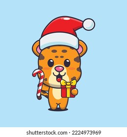 Cute leopard  holding christmas candy and gift. Cute christmas cartoon illustration. 