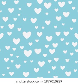 Cute light blue seamless pattern with hearts. Muted colors for home interior or wrapping paper or fabric. Cozy ornament for Valentines day or romantic holiday. Endless texture for home decor.