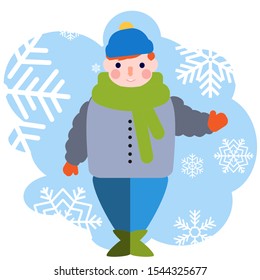 cute litte boy in warm winter clothes happy to see snowflakes