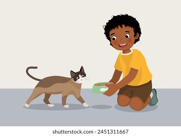 Cute little African boy feeding his pet cat with animal food at home