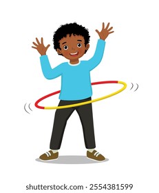 Cute little African boy playing hula hoop