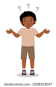 Cute little African boy shrugging her shoulders with clueless and confused expression