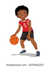 Cute little African boy with sportswear playing basketball dribbling the ball in action