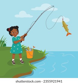 Cute little African girl fishing at the river catching big fishes