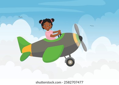 Cute little African girl flying an airplane in the blue sky
