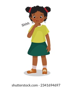 Cute little African girl making silence gesture putting her finger on lip asking to be quiet