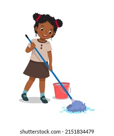 cute little African girl mopping the floor with mop and bucket doing housework chore at home