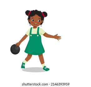 cute little African girl playing bowling in the sport club ready to throw the ball