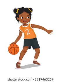 Cute little African girl with sportswear playing basketball dribbling the ball in action