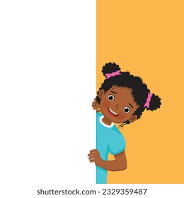 Cute little African girl standing behind blank board peeking and pointing to empty banner with finger