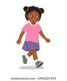 cute little African girl walking on the street