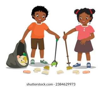 Cute little African kids collecting plastic bottles and papers waste with litter trash picker stick put into garbage bag for recycling to protect save environment