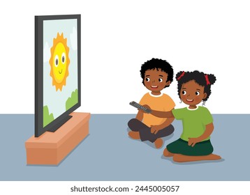 Cute little African kids watching TV sitting on the floor together