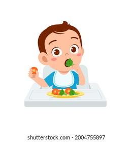 Cute Little Baby Boy Eat Fruit And Vegetable