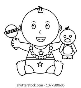 cute little baby boy sitting with duck and rattle toys