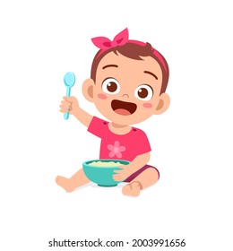 cute little baby girl eat porridge in bowl with spoon