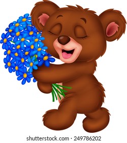 Cute little bear holding a bouquet