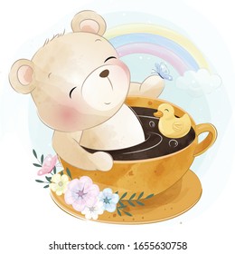 Cute little bear sitting inside a coffee cup