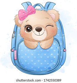 Cute little bear sitting inside bag