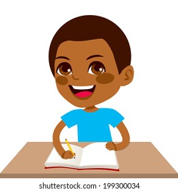 Cute Little Black Student Boy Writing And Smiling Happy Sitting On Desk