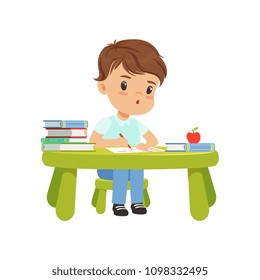 Cute little boy character sitting at the table and writing in a notebook vector Illustration on a white background