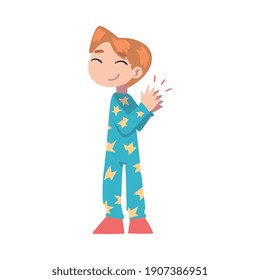 Cute Little Boy klatscht seine Hände, glückliches Kind trägt Pajamas, das Vergnügen, Wertschätzung, Illustration im Stil eines Delight Cartoon ausdrückt