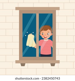 Cute little boy cleaning wiping window glass with cloth