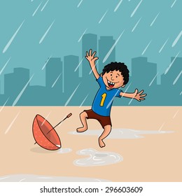Cute little boy dancing and enjoying rainy day with umbrella on urban city background.