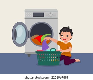 cute little boy doing laundry with washing machine as daily routine chores activity