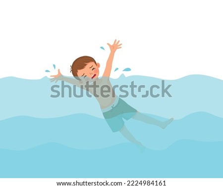 Cute little boy drowning in the swimming pool waving hands calling for help