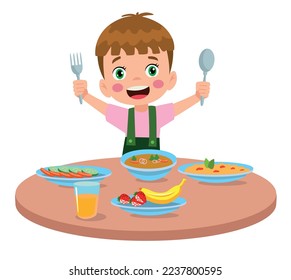 cute little boy eating at the dinner table