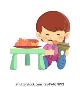 A cute little boy enjoying a pastry or snack with his coffee