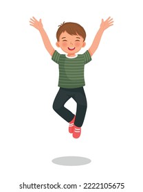 Cute Little Boy Get Excited Jumping With Both Hands Raise Up Feeling Happy